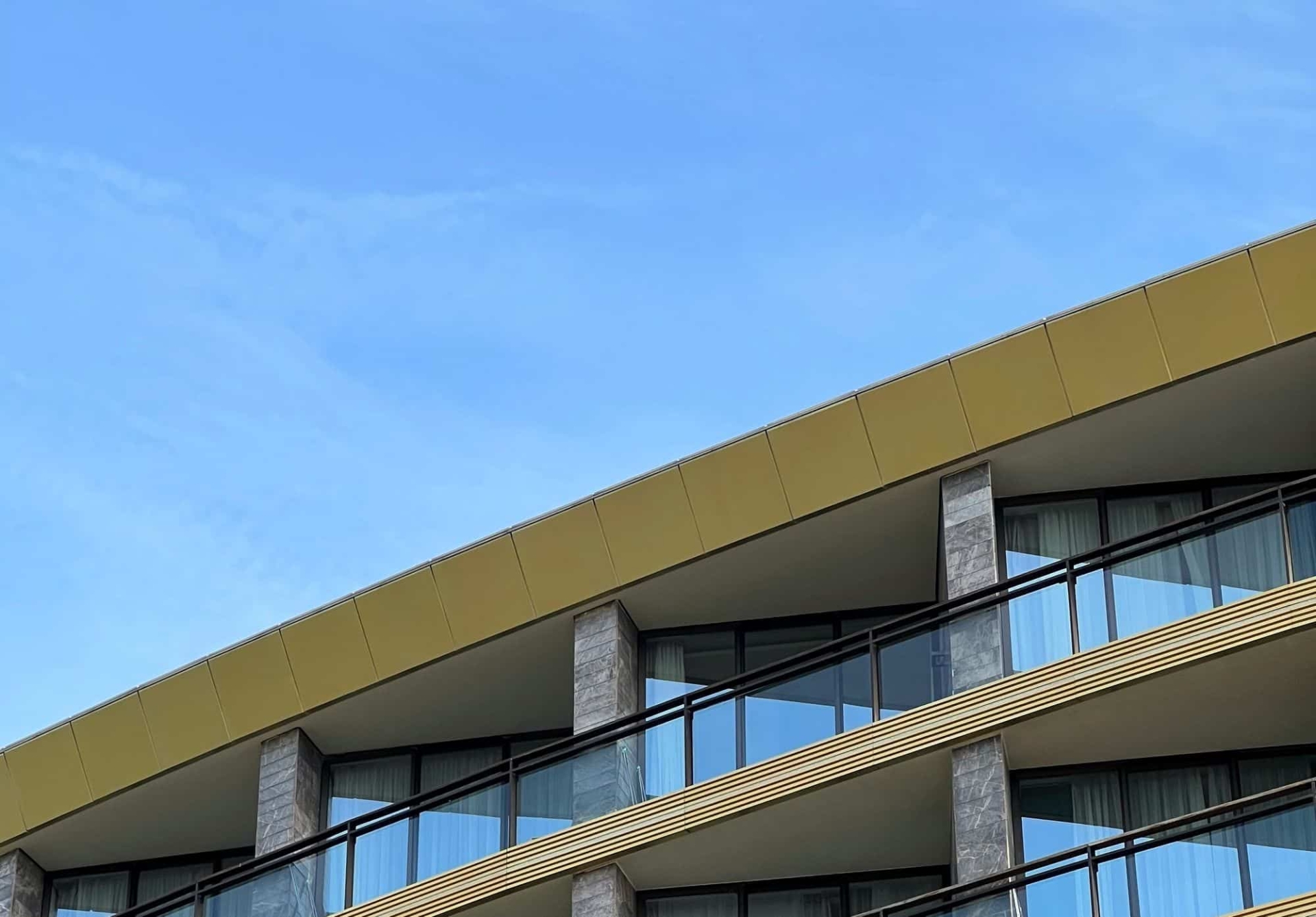 top of a building and blue sky